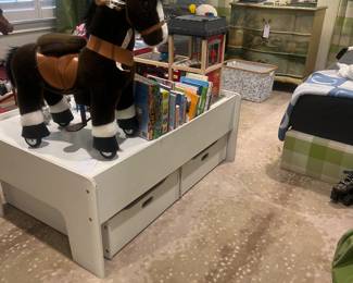 15’ x 11.5’ antelope rug, twin custom beds, white play table with rolling drawers 