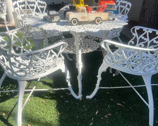 Cast iron vintage Victorian table and chairs