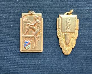 Mid-century commemorative sports pins from Algeria