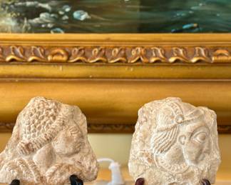 Antique stone heads