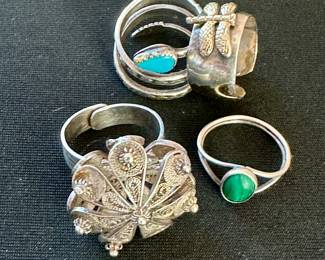 Rings, including Tiffany & Co. dragonfly (upper R)