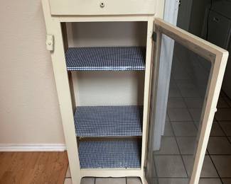 This little cabinet is adorable and has a mesh screen front. Would be so cute in a farm house setting.