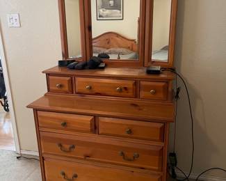 Dresser with Mirror is sold with the Queen sized bed frame and tall dresser as a set. Could possibly sold individually.