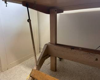 The base of the drafting table