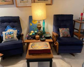 Two vintage Ranch Oak rocking chairs with  navy blue velvet upholstery, vintage Ranch Oak square coffee/ accent table between the chairs.