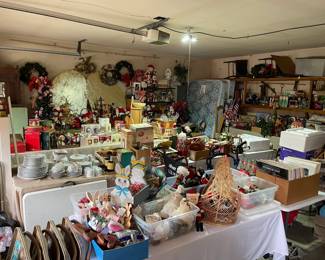 Another look into the garage, please note the vintage handmade large wood bells, top left