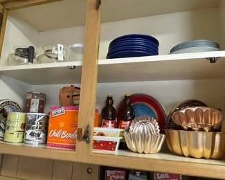 Vintage tins, coffee pots, baking molds in the kitchen