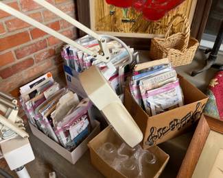 Lots of ephemera in packages found in the breeze way, glass shades, and more art work