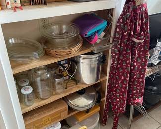 Lots of Pyrex, canning supplies, vintage cookbooks, can be found in the laundry room