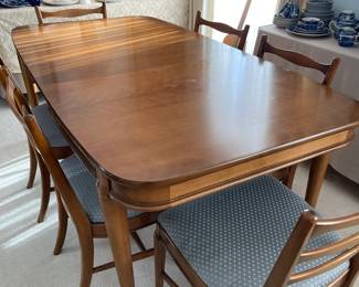 The vintage maple table with leaf, 69" long with leaf and 35" wide, the leaf is 12"