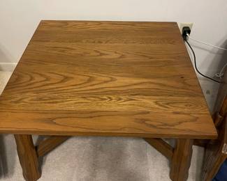 The square Ranch Oak coffee/accent table