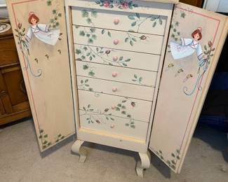 Jewelry chest with the doors open and showing the drawers
