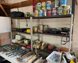Lots of hand tools, oil, electronics