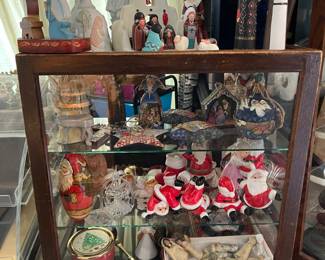 This showcase is full of vintage, Jim Shore, glass ornaments and Nativity pieces and can be found at the front register area