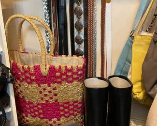 Master bedroom closet has great belts, purses, baskets, leather boots
