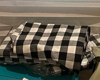 black and white buffalo check curtain. Also have white sheer curtains, navy blackout curtains and shower curtains