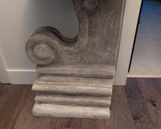 wooden architectural piece used as side table, gilt mirror