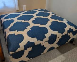 modern ottoman upholstered blue with nail head trim