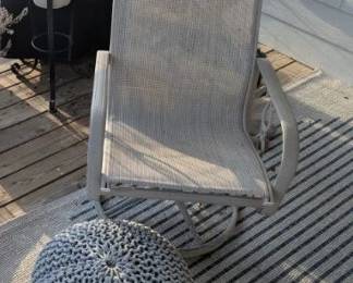 Grill, outdoor swivel chair, outdoor rug, ottoman, planters 