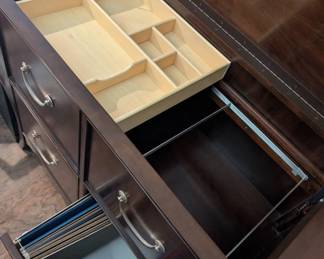 cabinet detail - hanging file draws, flip top access for storage drawer and top files