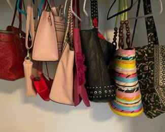 assortment of purses