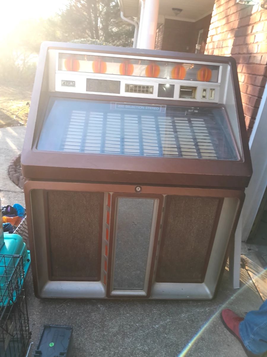 Vintage Juke Box with records. 1200.00 or best offer