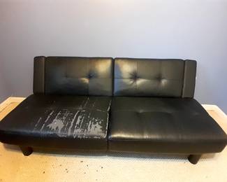 $50.00 This FUTON is great for extra seating or sleeping.