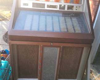 Vintage Juke Box with records. 1200.00 or best offer