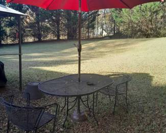 75.00 Large Patio Table set with 2 iron chairs  for the set
Large red umbrella $45.00 with the . metal stand