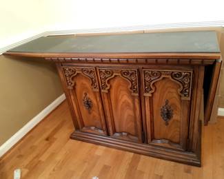 $60 Beautiful ornate side board. Excellent She Shed or Man Cave Beverage bar.