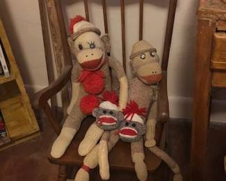 Sock monkeys and vintage child's rocking chair.