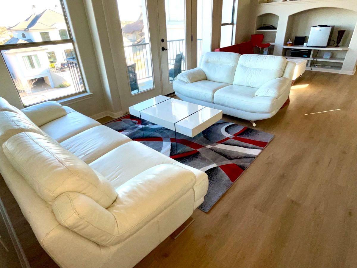 White leather sofa and love seat