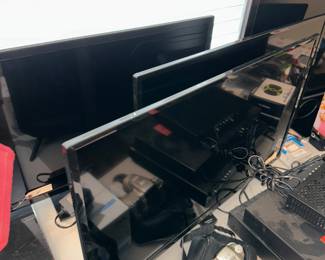 3 small flat screen TV’s