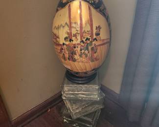 Blocks holding Oriental designed urn