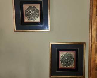 Pictures on wall in bedroom