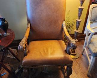 Leather chair with curved arms & legs