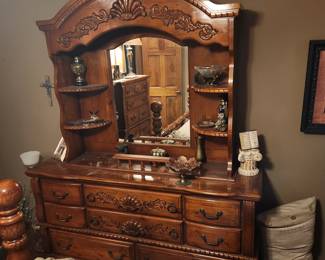 Dresser in bedroom with miscellaneous decor