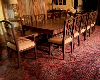 D/R table 11 ft w 14 hand carved chairs