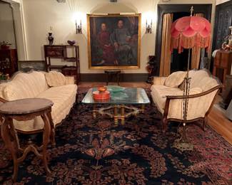 Pair of couches ( Painting not fot sale) in enrty