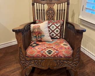 Gorgeous antique rocker, which has newly recovered upholstered seat