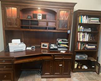 Epic HOOKER desk with light built inside. Also plugs on the pull out computer drawer. Just beautiful.