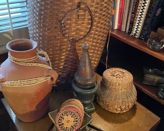 Vintage baskets, pottery, and brass