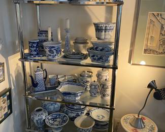 Blue and white pottery and china planters, urns, ginger jars, vases, and side tables