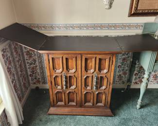 Drexel Heritage dining room set, purchased new in 1975.  Table, with 2 leaves & 6 chairs: table measures 70" x 42", comes with TWO 20" leaves ($200.00).  China cabinet measures 72" wide x 83 1/2" tall x 14" deep ($150.00).  Bar/server, with flip top, measures (top closed) 32" wide x 35 1/2" tall x 18 1/2" deep (add 32" TOTAL with top opened) $90.00