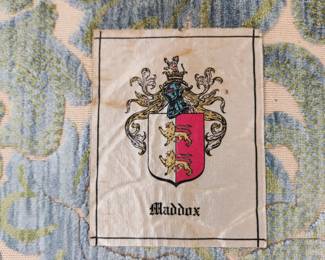 vintage sofa by Maddox.  Sun/time faded, used to be blue.  Measures 86" long x 35" deep x 26" tall (at back).  Obviously needs to be recovered.  Soft and VERY comfortable (low to ground).  $75.00