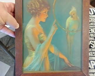 framed old cutout with heavy leaded glass on back 