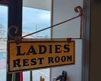 vintage ladies rest room sign and holder 