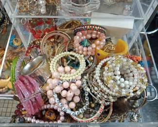 Tons of costume jewelry, rings, bracelets, earrings, and more 