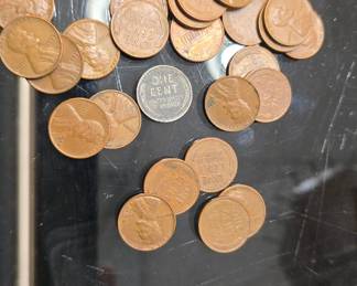 unsearched wheat pennies and one steel penny 
