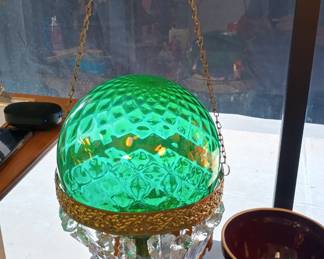 gazing ball stuffed in a hanging chandelier that's how we found it so that's how were selling it lol 